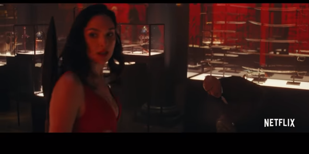 "Red Notice" exposes Exclusive Clip, Wonder Woman and Deadpool fight each other