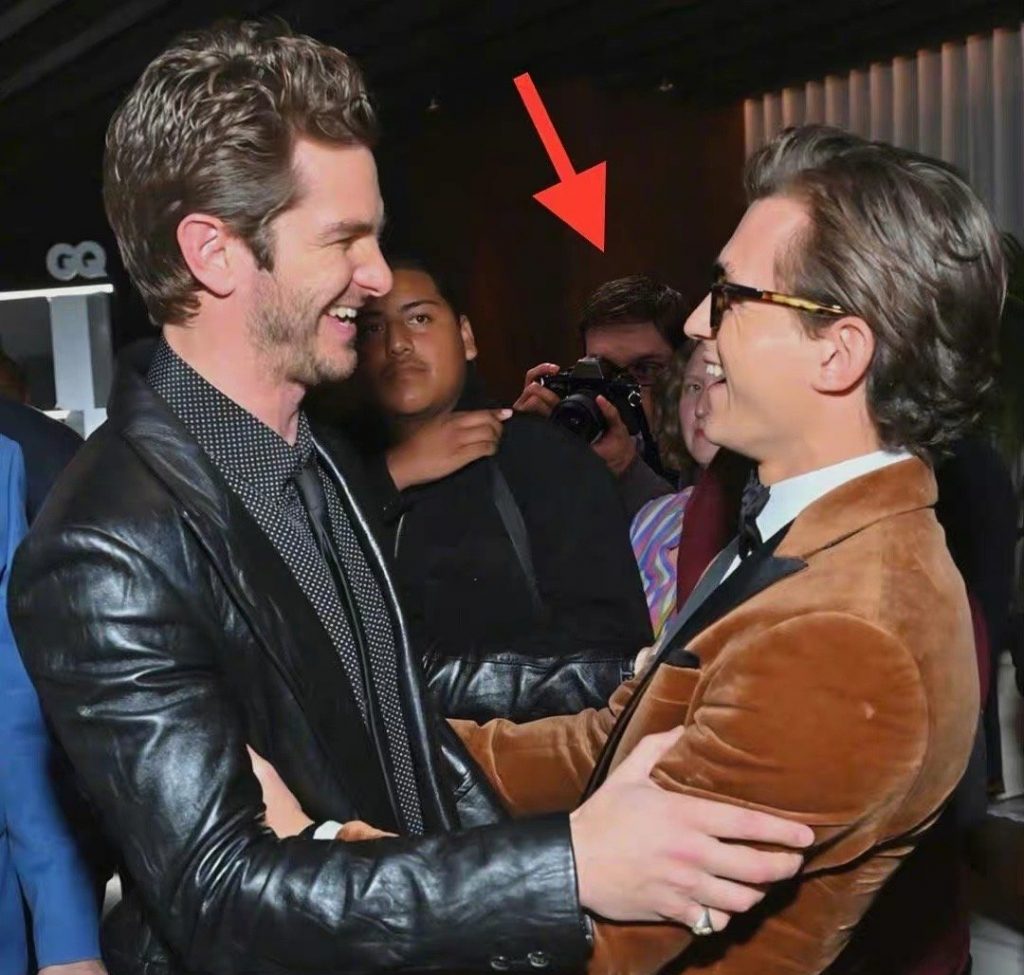 Two generations of "Spider-Man" are in the same frame! Andrew Garfield & Tom Holland embrace each other warmly