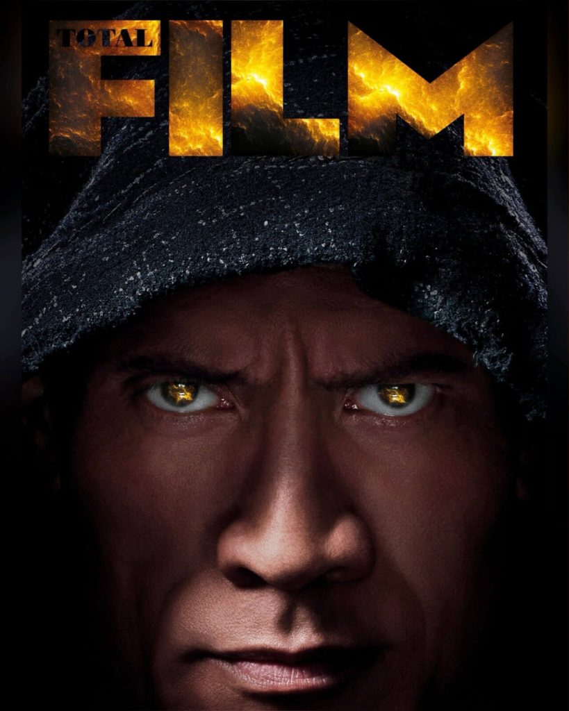 DC's "Black Adam" is on the cover of the magazine, Dwayne Johnson's eyes are glowing, and it contains flames