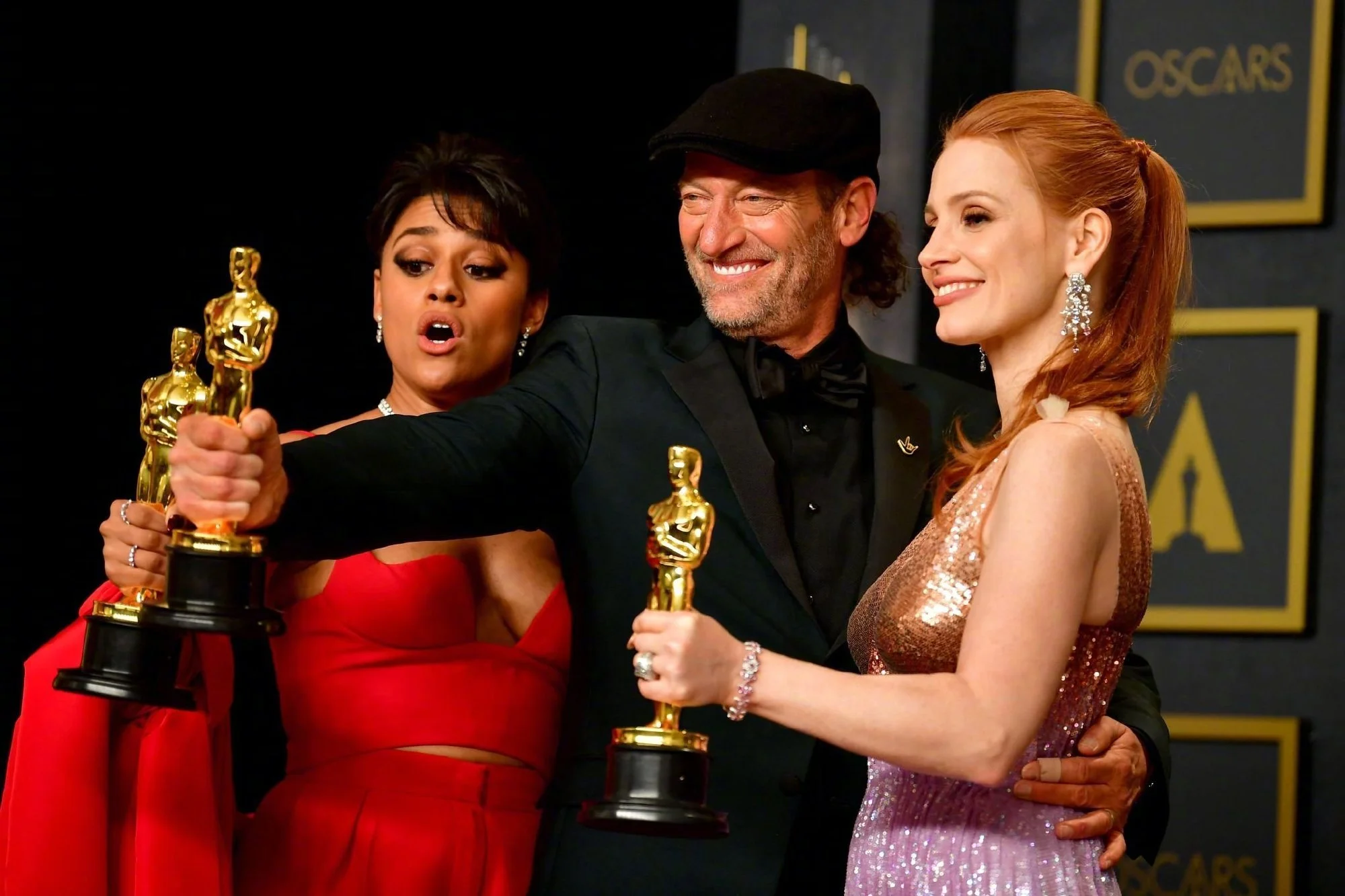 Group photo of 94th Academy Acting Award winners Ariana DeBose, Troy Kotsur, Jessica Chastain​​​