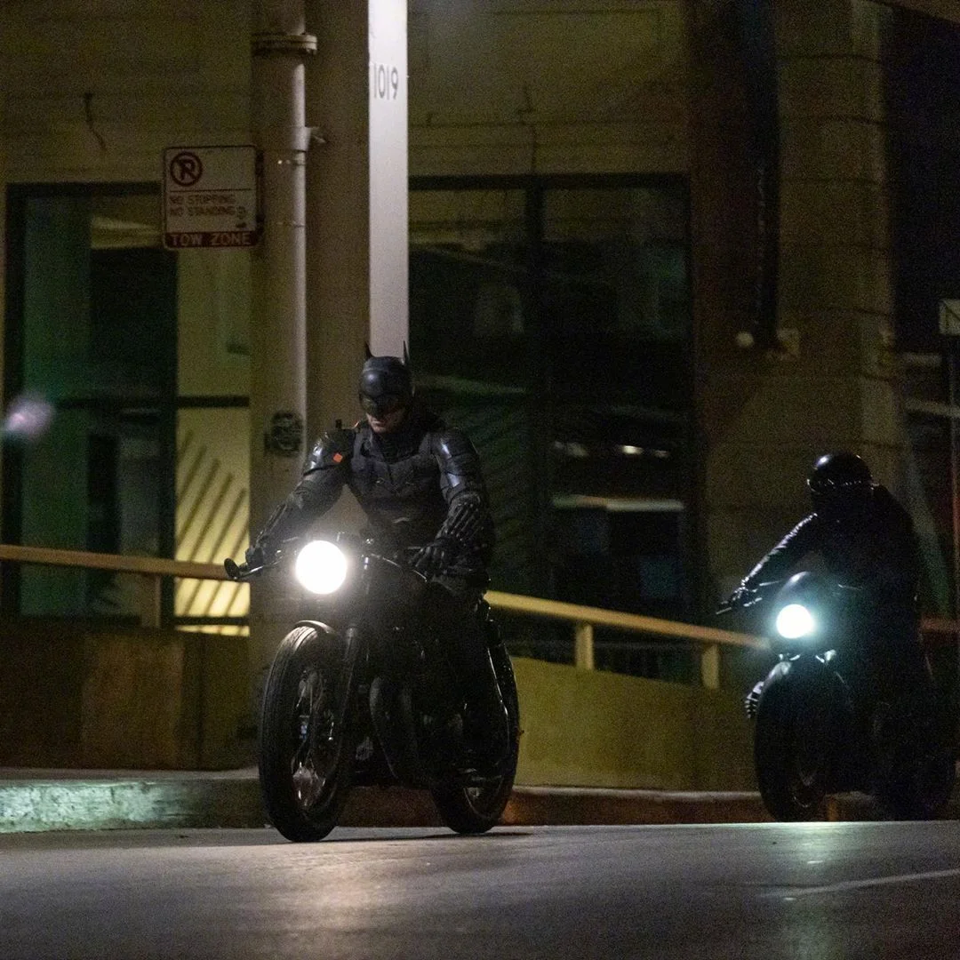 Some set photos of Batman and Catwoman flying together with Moto