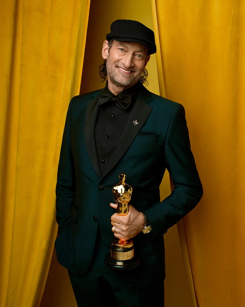 Troy Kotsur in "Variety" magazine ​​​with his Oscar trophy ​​​