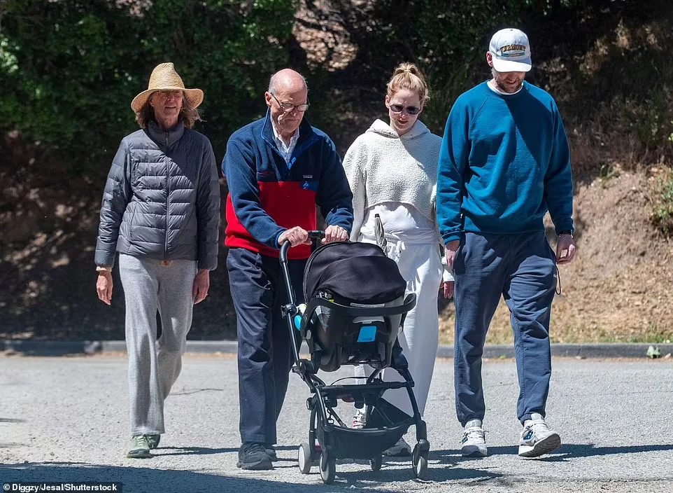 Jennifer Lawrence and Cooke Maroney walk with their two-month-old baby for exercise ​​​
