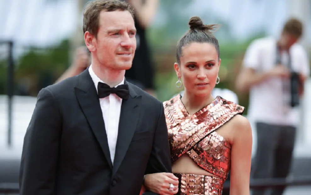 Alicia Vikander and Michael Fassbender on the red carpet at the "Holy Spider" Cannes Film Festival