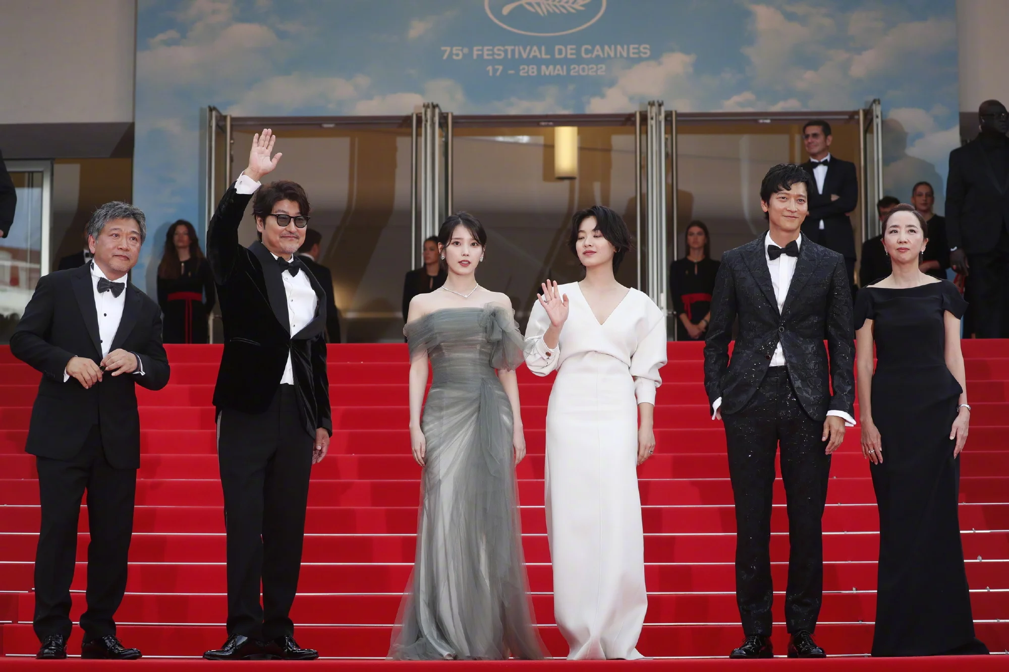 Lee Ji Eun wears a smoky tulle dress on the red carpet for the 'Broker' Cannes premiere