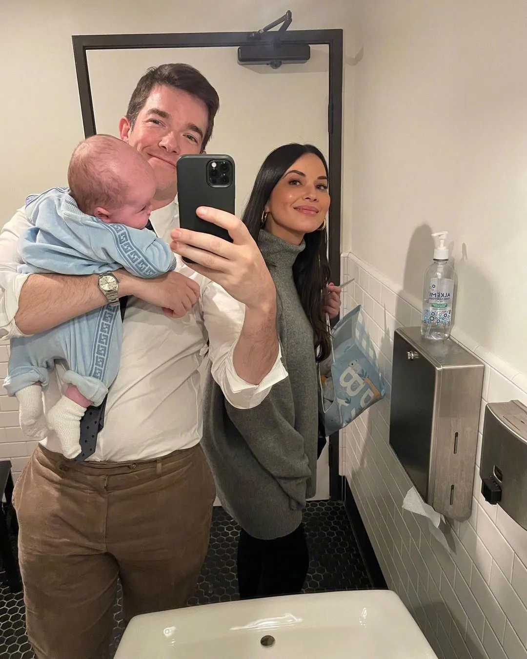 Olivia Munn and John Mulaney take a selfie with their son