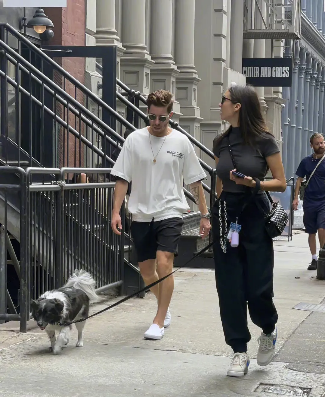 Nina Dobrev and Shaun White walk their dogs on the street | FMV6