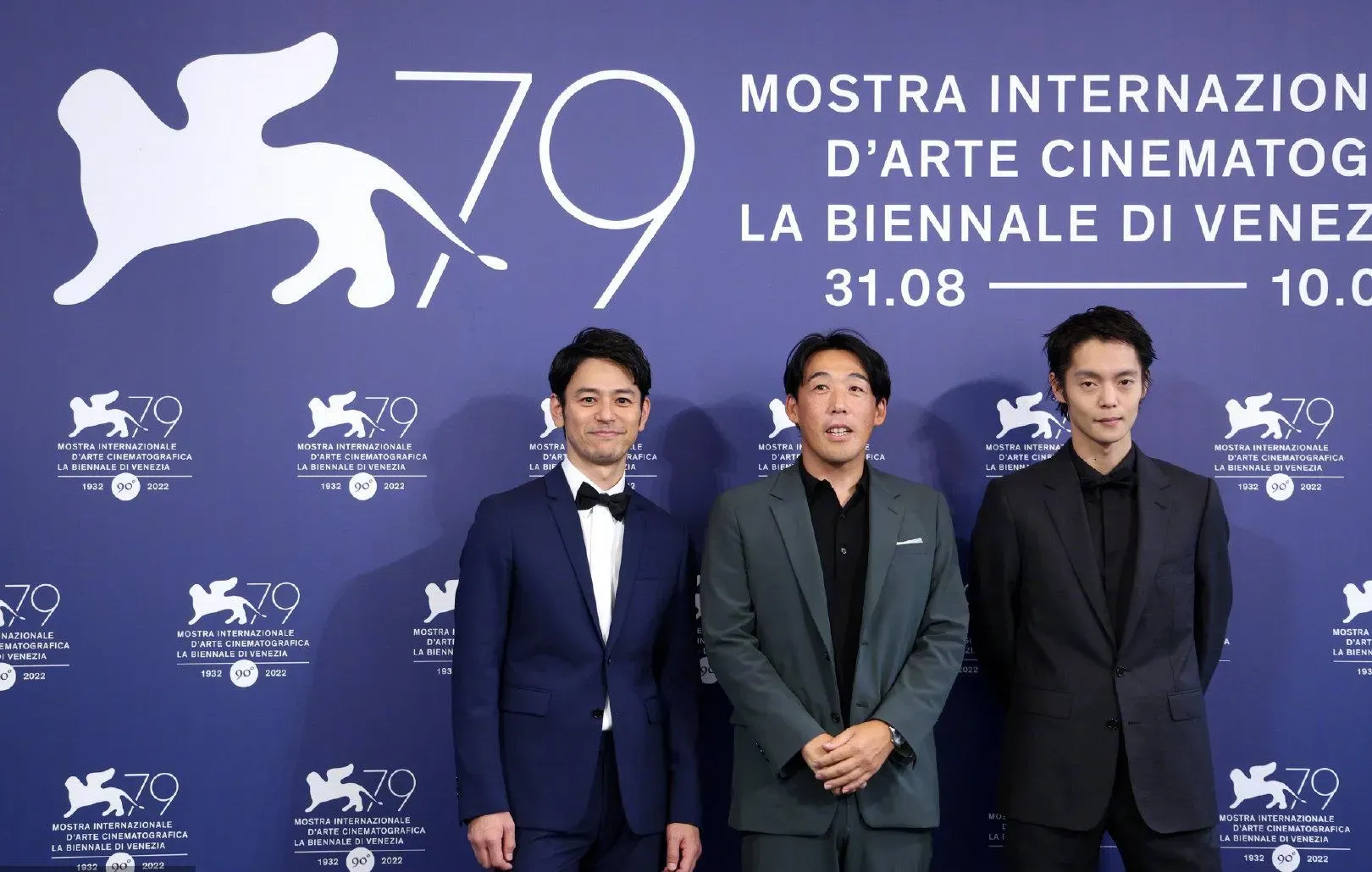 Satoshi Tsumabuki, Masataka Kubota and Kei Ishikawa attend the premiere of 'A Man' at the 79th Venice International Film Festival | FMV6