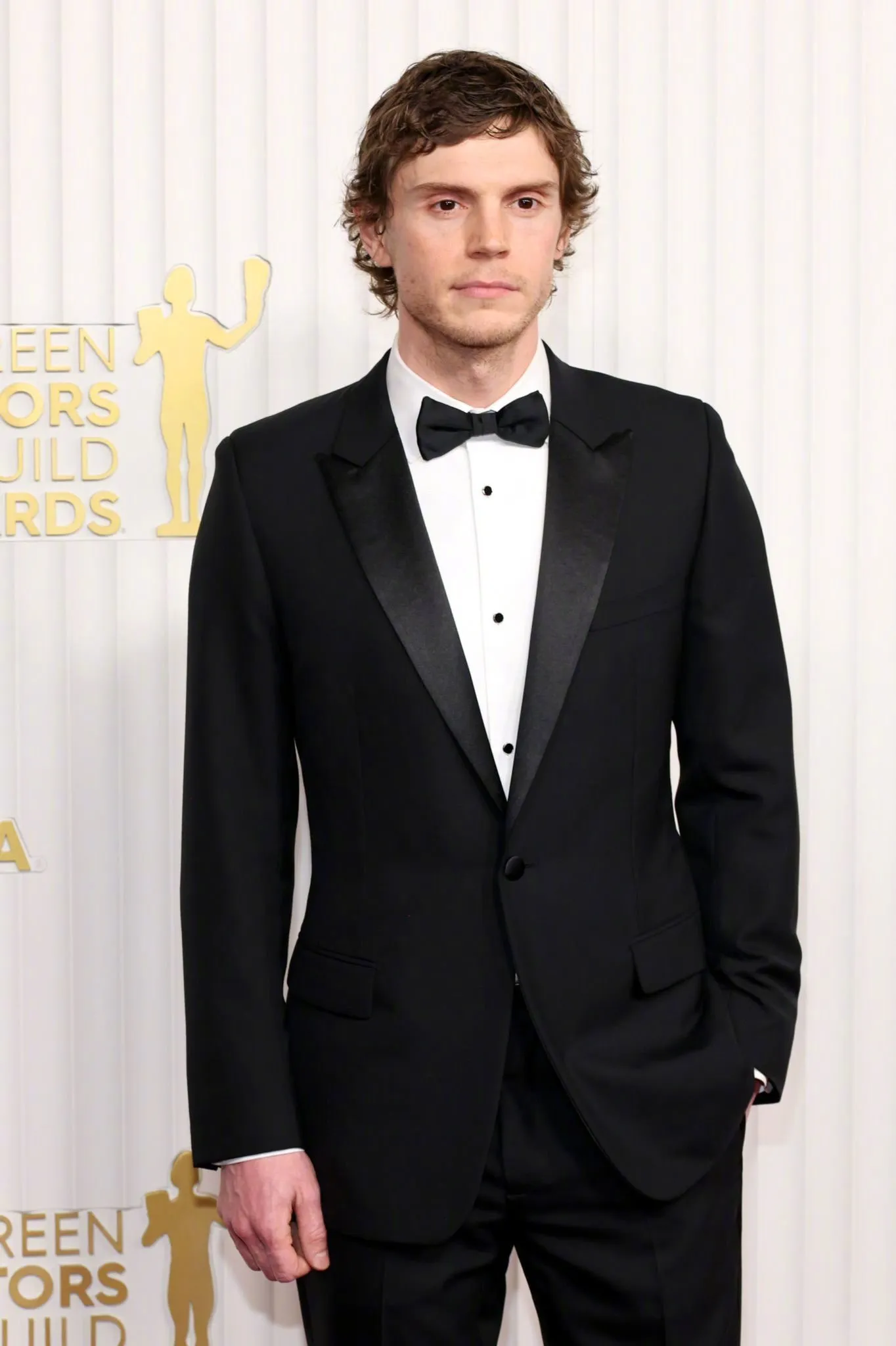 Evan Peters attends 2023 Screen Actors Guild Awards red carpet | FMV6