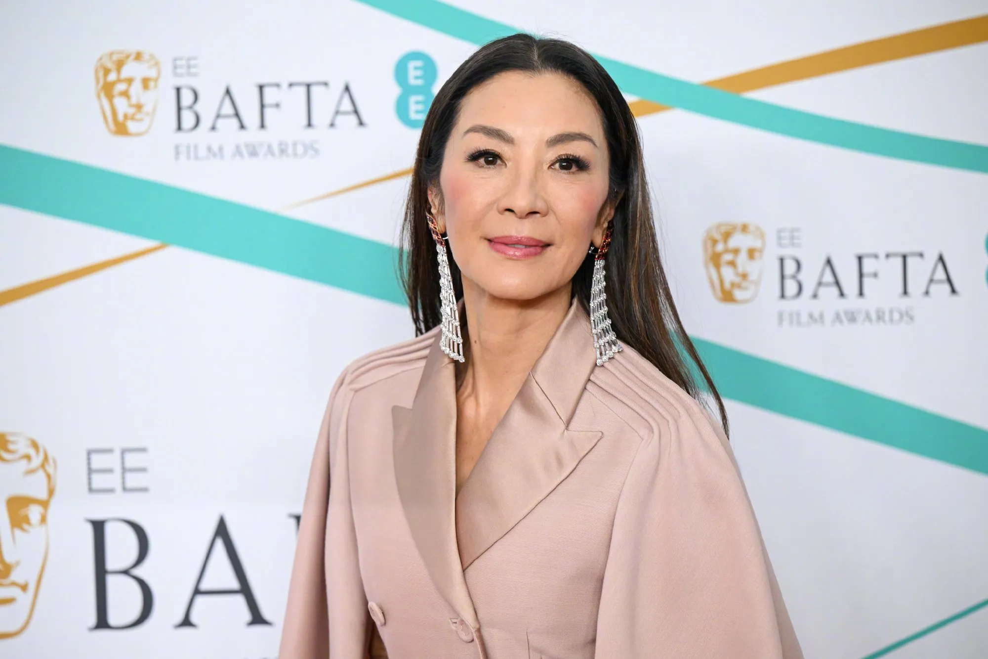 Michelle Yeoh attends 2023 British Academy Film Awards red carpet | FMV6