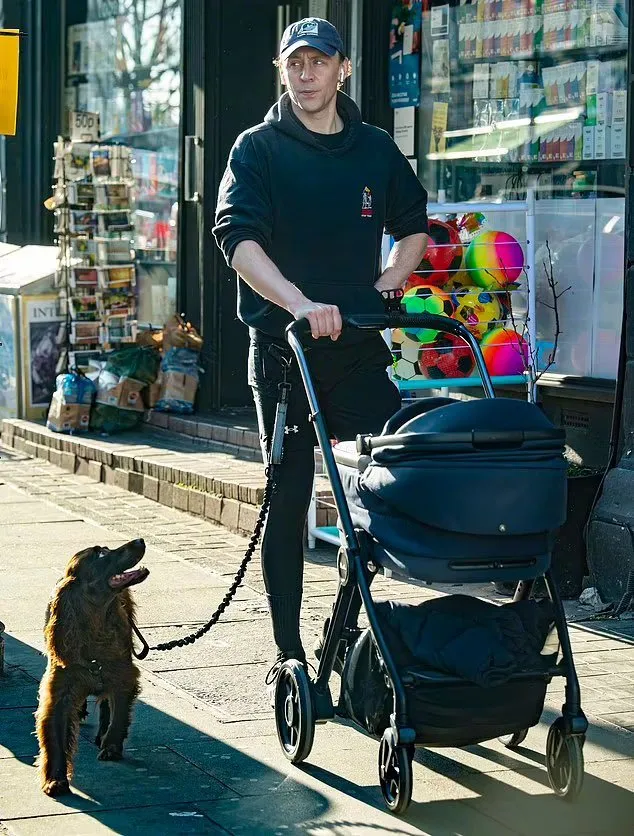 Photos of Tom Hiddleston taking his baby out | FMV6